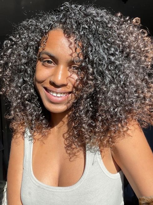 A woman smiling