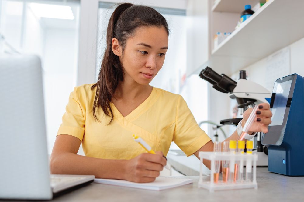 Female Murray Hill staff member running diagnostics
